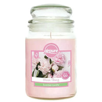 Scented candle in a glass jar with 'airpure' branding on a white background