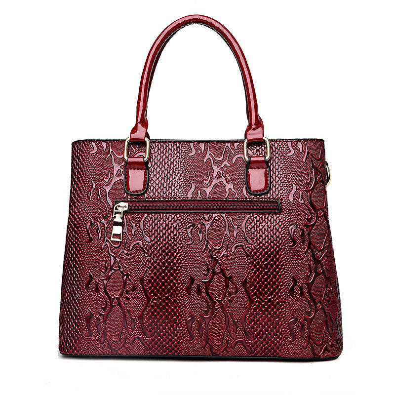 Ladies Handbag In Patent Leather Snake Print