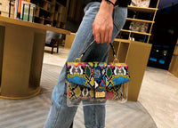 Women's snake print shoulder bag