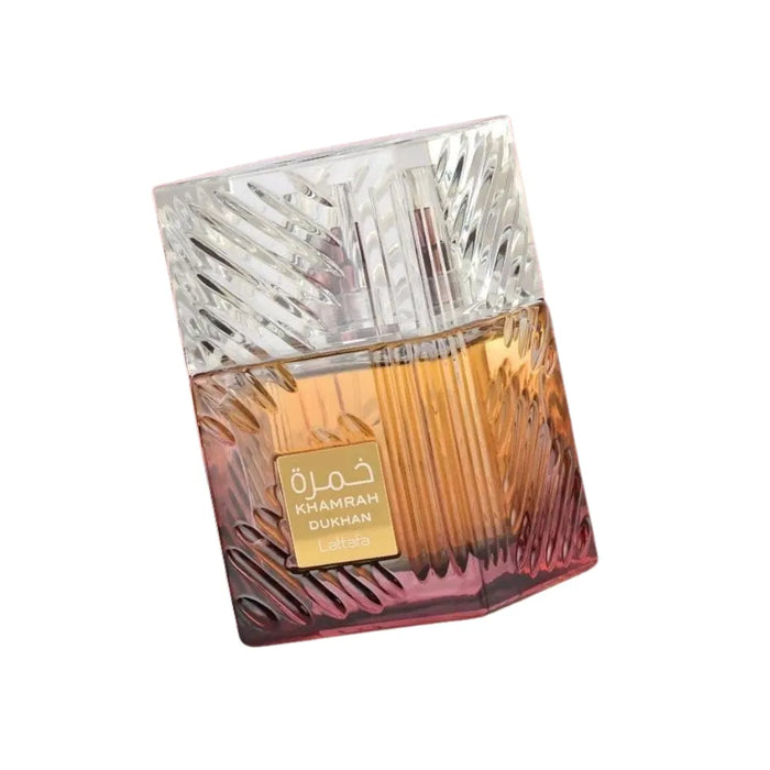 Perfume bottle with a textured design on a white background
