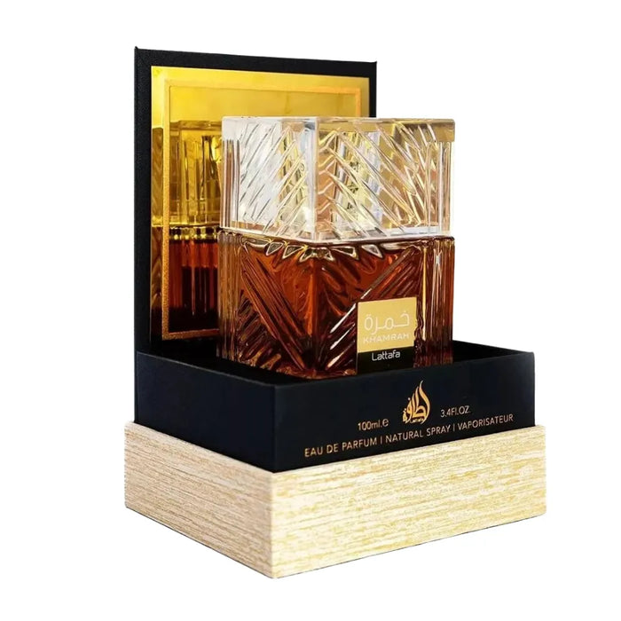 Eau de Parfum bottle with packaging on a white background