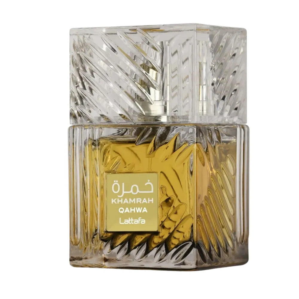 Perfume bottle with intricate design and gold label on a white background