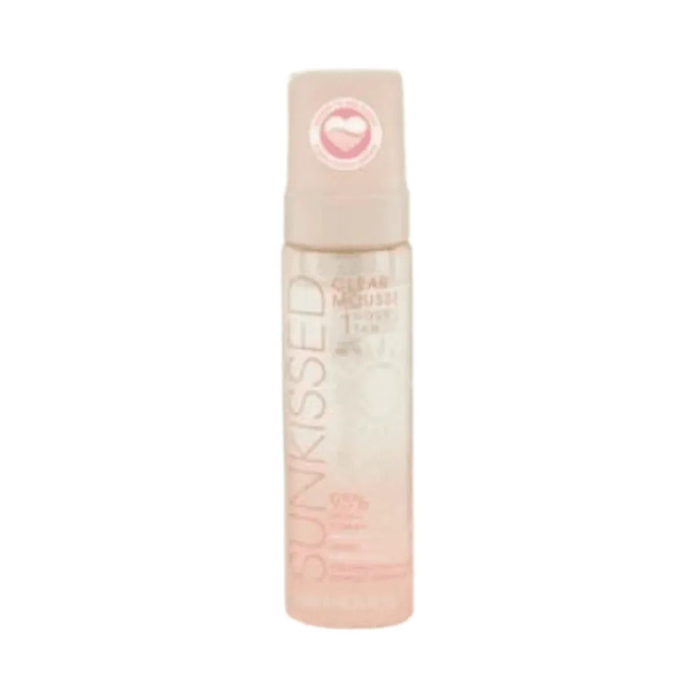 Pink bottle of makeup remover on a white background