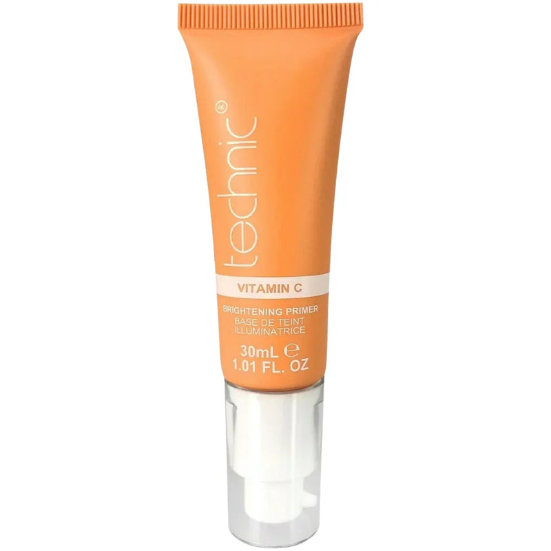 Orange skincare tube with 'technic' branding on a white background