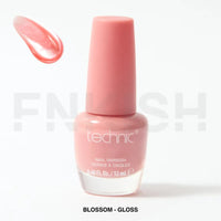 Pink nail polish bottle with a swatch on a white background