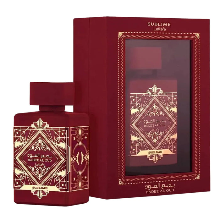 Red perfume bottle and packaging with gold geometric designs on a white background